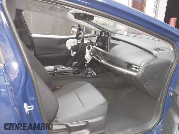 2024 Toyota Prius LE with VIN JTDACAAU0R3030582, listed as a IAAI auction lot 41838615 with 9,402 mi miles and . Bid and sale history available at DreamBid. Image 5.