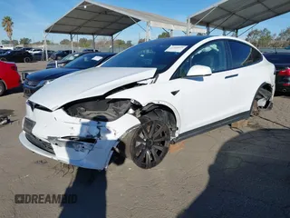2022 Tesla Model X with VIN 7SAXCBE56NF329657, listed as a IAAI auction lot 41400629 with Not Provided miles and . Bid and sale history available at DreamBid. Image 18.