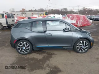 2017 BMW i3 z VIN WBY1Z8C39HV891353, wystawiony jako IAAI lot #41887562 z przebiegiem 82 295 mil mil oraz . Historia ofert i sprzedaży dostępna na DreamBid. Obrazek 13.