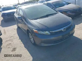 2012 Honda Civic LX z VIN 2HGFB2F59CH563102, wystawiony jako IAAI lot #41997184 z przebiegiem 161 547 mil mil oraz . Historia ofert i sprzedaży dostępna na DreamBid. Obrazek 1.