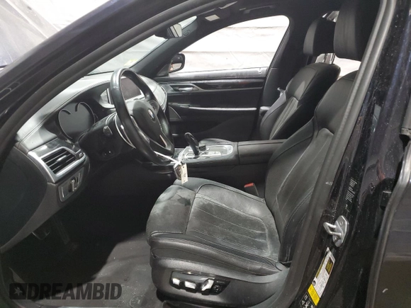 2019 BMW 7 Series 740i xDrive with VIN WBA7E4C58KGV70026, listed as a Copart auction lot 59465615 with Not provided miles and Salvage title. Bid and sale history available at DreamBid. Image 7.