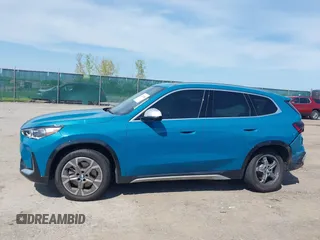 2023 BMW X1 xDrive28i with VIN WBX73EF00P5W52935, listed as a IAAI auction lot 42221084 with 16,394 mi miles and . Bid and sale history available at DreamBid. Image 14.
