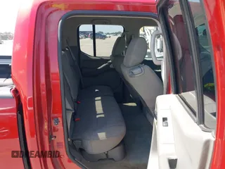 2014 Nissan Frontier SV z VIN 1N6AD0FR1EN766633, wystawiony jako IAAI lot #42453514 z przebiegiem 96 811 mil mil oraz . Historia ofert i sprzedaży dostępna na DreamBid. Obrazek 8.