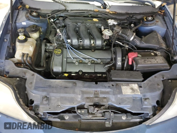 2002 Mercury Sable LS with VIN 1MEHM55S12A654810, listed as a Copart auction lot 83073514 with 185,246 mi miles and Salvage Title. Bid and sale history available at DreamBid. Image 11.