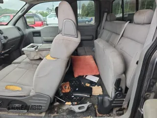 2005 Ford F-150 STX with VIN 1FTRX12W55FB32573, listed as a Copart auction lot 59602715 with 238,701 mi miles and Salvage title. Bid and sale history available at DreamBid. Image 10.