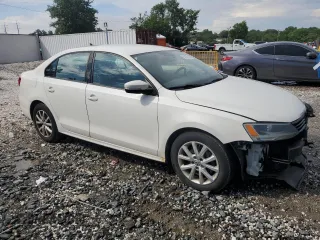 2012 Volkswagen Jetta SE with VIN 3VWDX7AJ3CM472074, listed as a Copart auction lot 61433125 with 185,861 mi miles and Salvage title. Bid and sale history available at DreamBid. Image 4.
