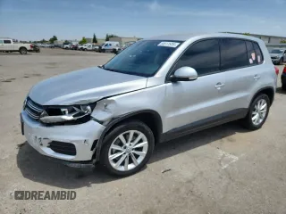 2014 Volkswagen Tiguan SE with VIN WVGAV3AX3EW590861, listed as a Copart auction lot 58517535 with 68,481 mi miles and Salvage title. Bid and sale history available at DreamBid. Image 1.