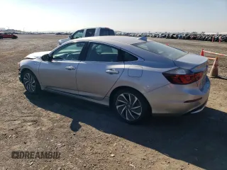 2020 Honda Insight Touring with VIN 19XZE4F92LE014287, listed as a Copart auction lot 80283814 with 67,272 mi miles and Salvage Title. Bid and sale history available at carsss.com. Image 2.