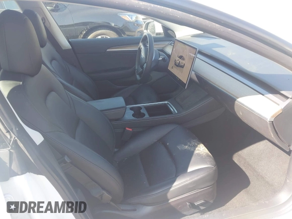 2022 Tesla Model 3 with VIN 5YJ3E1EA2NF245817, listed as a IAAI auction lot 41976493 with 32,710 mi miles and . Bid and sale history available at DreamBid. Image 5.