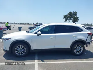 2019 Mazda CX-9 Touring with VIN JM3TCACY8K0300956, listed as a IAAI auction lot 42493003 with 123,709 mi miles and . Bid and sale history available at DreamBid. Image 15.