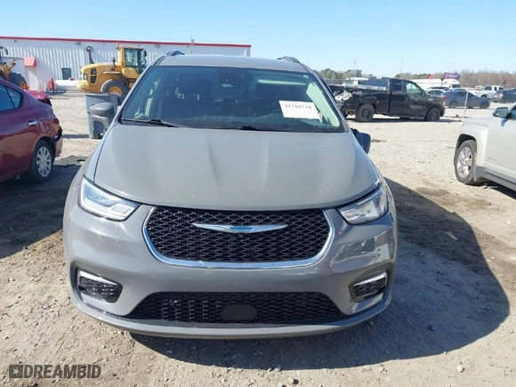 2021 Chrysler Pacifica Hybrid Touring L with VIN 2C4RC1L76MR597034, listed as a IAAI auction lot 41516718 with 79,910 mi miles. Bid and sale history available at carsss.com. Image 12.