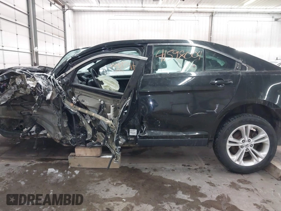 2015 Ford Taurus SEL with VIN 1FAHP2E81FG181897, listed as a IAAI auction lot 41598004 with Not Provided miles and . Bid and sale history available at carsss.com. Image 15.