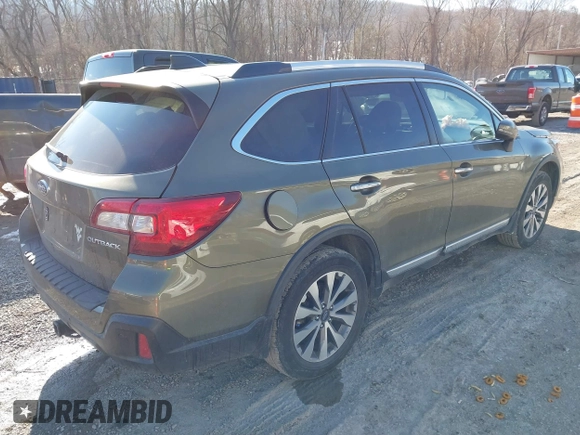 2019 Subaru Outback Touring with VIN 4S4BSATC7K3272301, listed as a IAAI auction lot 41318172 with 102,417 mi miles and . Bid and sale history available at DreamBid. Image 4.