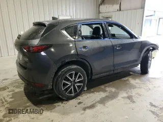 2018 Mazda CX-5 Grand Touring with VIN JM3KFBDM1J0440849, listed as a Copart auction lot 58354655 with 43,348 mi miles and Salvage title. Bid and sale history available at DreamBid. Image 3.