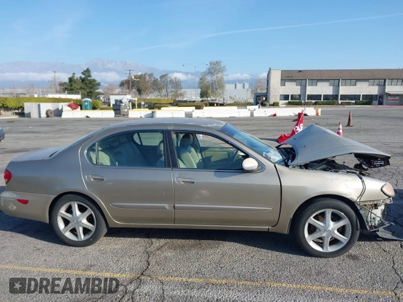 2002 Infiniti I35 Luxury z VIN JNKDA31A52T027346, wystawiony jako IAAI lot #41709863 z przebiegiem 227 266 mil mil oraz . Historia ofert i sprzedaży dostępna na DreamBid. Obrazek 13.