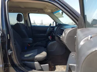 2014 Jeep Patriot Sport with VIN 1C4NJRBB6ED533895, listed as a IAAI auction lot 42206470 with 104,603 mi miles. Bid and sale history available at carsss.com. Image 5.