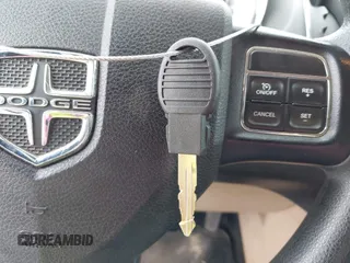 2015 Dodge Grand Caravan SXT with VIN 2C4RDGCG2FR548433, listed as a IAAI auction lot 42121256 with 161,459 mi miles and . Bid and sale history available at DreamBid. Image 11.