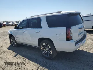 2020 GMC Yukon Denali with VIN 1GKS2CKJ0LR109590, listed as a Copart auction lot 68700384 with 55,310 mi miles and Salvage Title. Bid and sale history available at carsss.com. Image 2.