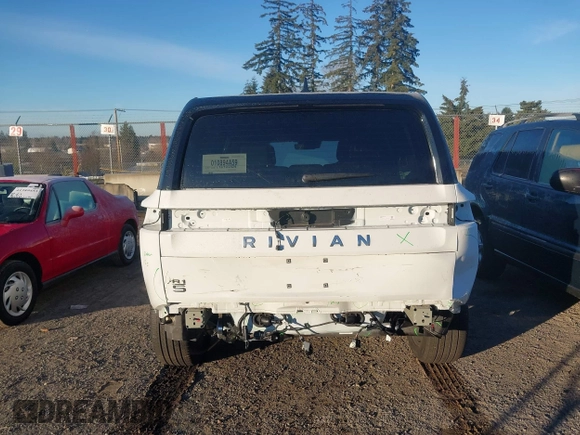 2025 Rivian R1S Adventure z VIN 7PDSGBBA3SN052257, wystawiony jako IAAI lot #41289615 z przebiegiem 2746 mil mil oraz . Historia ofert i sprzedaży dostępna na DreamBid. Obrazek 17.
