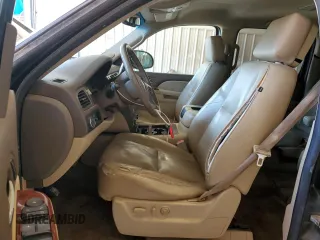 2010 Chevrolet Suburban LTZ with VIN 1GNUCKE09AR146804, listed as a Copart auction lot 56639764 with 210,705 mi miles and Salvage Title. Bid and sale history available at carsss.com. Image 7.