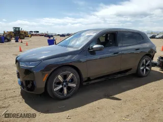 2023 BMW iX xDrive50 with VIN WB523CF03PCM09655, listed as a Copart auction lot 52922124 with 3,159 mi miles. Bid and sale history available at carsss.com. Image 1.