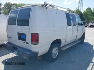 2009 Ford Econoline Cargo with VIN 1FTNE24W99DA45347, listed as a IAAI auction lot 42068121 with 301,292 mi miles. Bid and sale history available at carsss.com. Image 4.