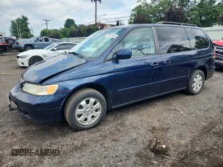 2003 Honda Odyssey EX-L with VIN 5FNRL18933B039209, listed as a Copart auction lot 61349245 with 215,269 mi miles and Salvage title. Bid and sale history available at DreamBid. Image 1.