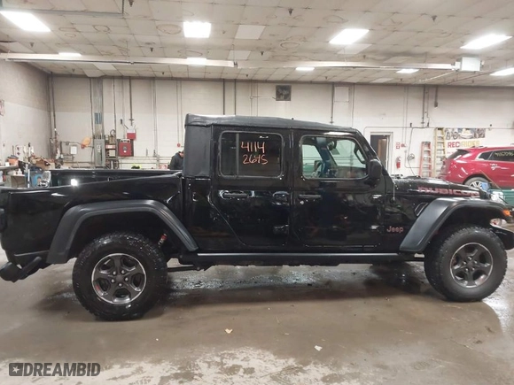 2022 Jeep Gladiator Rubicon with VIN 1C6JJTBGXNL112413, listed as a IAAI auction lot 41142645 with NaN miles. Bid and sale history available at carsss.com. Image 13.