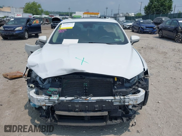 2020 Ford Fusion SE with VIN 3FA6P0LUXLR155881, listed as a IAAI auction lot 42426199 with 103,809 mi miles and . Bid and sale history available at DreamBid. Image 13.