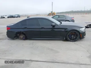 2019 BMW M5 z VIN WBSJF0C51KB447804, wystawiony jako IAAI lot #41848760 z przebiegiem 83 303 mil mil oraz . Historia ofert i sprzedaży dostępna na DreamBid. Obrazek 13.