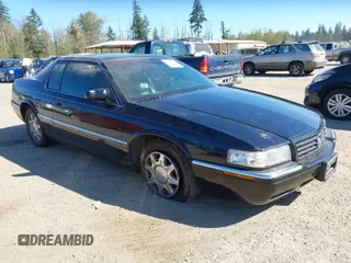 1998 Cadillac Eldorado Touring with VIN 1G6ET1295WU610253, listed as a IAAI auction lot 42066181 with 85,172 mi miles and . Bid and sale history available at DreamBid. Image 1.