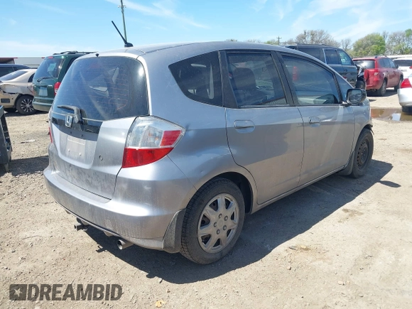 2009 Honda Fit with VIN JHMGE88249S036133, listed as a IAAI auction lot 41788358 with 128,613 mi miles. Bid and sale history available at carsss.com. Image 4.