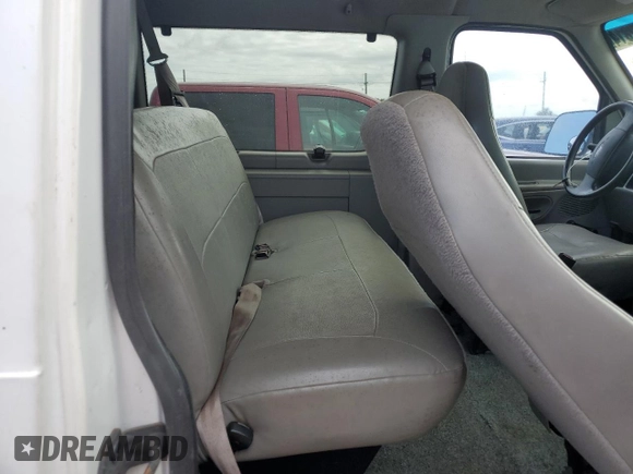 2000 Ford Econoline Passenger XL with VIN 1FBSS31L1YHB80264, listed as a Copart auction lot 74762814 with 61,702 mi miles and Salvage Title. Bid and sale history available at DreamBid. Image 11.