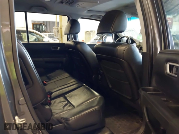 2011 Honda Pilot EX-L with VIN 5FNYF4H65BB020721, listed as a IAAI auction lot 41794436 with 113,630 mi miles and . Bid and sale history available at carsss.com. Image 8.
