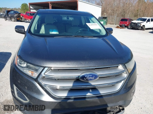 2015 Ford Edge Titanium z VIN 2FMTK3K90FBB13499, wystawiony jako IAAI lot #41492084 z przebiegiem 256 649 mil mil oraz . Historia ofert i sprzedaży dostępna na DreamBid. Obrazek 12.