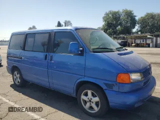 2003 Volkswagen EuroVan с VIN WV2KB470X3H028721, выставлен на аукционе Copart как лот 57531425 с пробегом 233 629 миль миль и Чистый • Clean title. История ставок и продаж доступна на DreamBid. Изображение 4.
