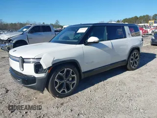 2025 Rivian R1S Adventure with VIN 7PDSGBBA0SN049154, listed as a IAAI auction lot 41160166 with 3,036 mi miles. Bid and sale history available at carsss.com. Image 2.