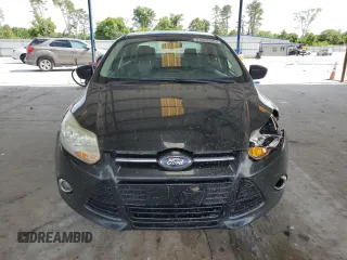 2012 Ford Focus SE with VIN 1FAHP3F29CL346226, listed as a Copart auction lot 61029345 with 172,533 mi miles and Salvage title. Bid and sale history available at DreamBid. Image 5.
