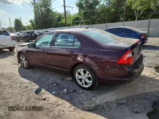 2012 Ford Fusion SE z VIN 3FAHP0HA7CR387524, wystawiony jako Copart lot #62083235 z przebiegiem 104 698 mil mil oraz Szkoda całkowita • Salvage title. Historia ofert i sprzedaży dostępna na DreamBid. Obrazek 2.