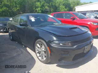 2023 Dodge Charger GT with VIN 2C3CDXHG8PH579373, listed as a IAAI auction lot 42001295 with 57,006 mi miles. Bid and sale history available at carsss.com. Image 1.