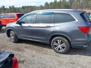 2017 Honda Pilot EX-L with VIN 5FNYF6H5XHB009029, listed as a IAAI auction lot 41883366 with 95,711 mi miles and . Bid and sale history available at DreamBid. Image 14.