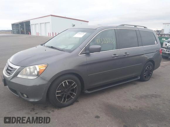 2008 Honda Odyssey Touring with VIN 5FNRL38888B018625, listed as a IAAI auction lot 41383235 with 215,255 mi miles. Bid and sale history available at carsss.com. Image 2.