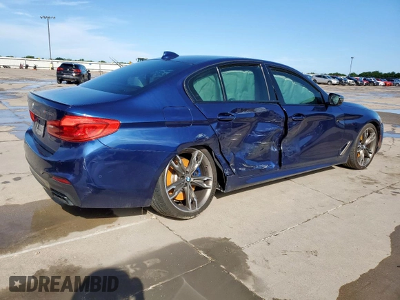 2020 BMW 5 Series M550i xDrive with VIN WBAJS7C09LCE06865, listed as a Copart auction lot 60140955 with Not provided miles and Salvage title. Bid and sale history available at DreamBid. Image 3.