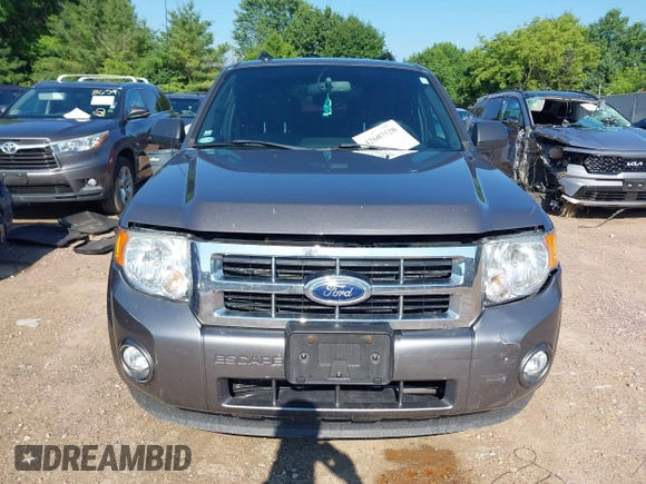 2012 Ford Escape XLT z VIN 1FMCU9DG7CKB28270, wystawiony jako IAAI lot #42607520 z przebiegiem 129 758 mil mil oraz . Historia ofert i sprzedaży dostępna na DreamBid. Obrazek 12.