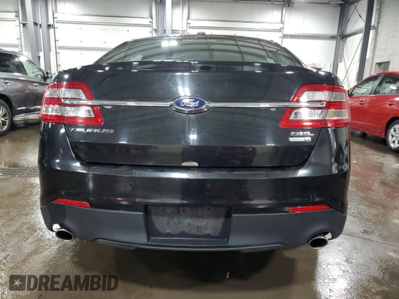 2015 Ford Taurus SEL with VIN 1FAHP2H89FG172117, listed as a Copart auction lot 49491575 with 134,922 mi miles and Salvage Title. Bid and sale history available at carsss.com. Image 6.