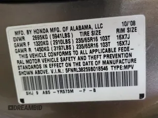 2009 Honda Odyssey LX with VIN 5FNRL38259B018546, listed as a Copart auction lot 62142015 with 162,459 mi miles and Salvage title. Bid and sale history available at DreamBid. Image 13.