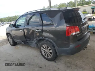 2011 Kia Sorento EX with VIN 5XYKU3A11BG134695, listed as a Copart auction lot 60104135 with 227,552 mi miles and Salvage title. Bid and sale history available at DreamBid. Image 2.