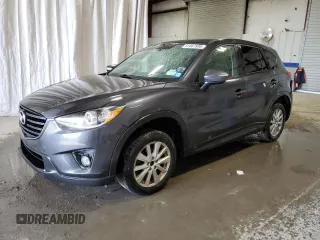 2016 Mazda CX-5 Touring with VIN JM3KE4CY3G0716346, listed as a Copart auction lot 51467895 with 133,218 mi miles and Salvage Title. Bid and sale history available at carsss.com. Image 1.