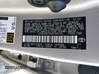 2021 Toyota Prius LE with VIN JTDKAMFPXM3184126, listed as a Copart auction lot 56857675 with 54,676 mi miles and Clean Title. Bid and sale history available at DreamBid. Image 13.