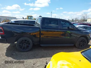 2023 Ram 1500 Laramie with VIN 1C6SRFJT6PN542105, listed as a IAAI auction lot 41974428 with 74,489 mi miles and . Bid and sale history available at DreamBid. Image 13.